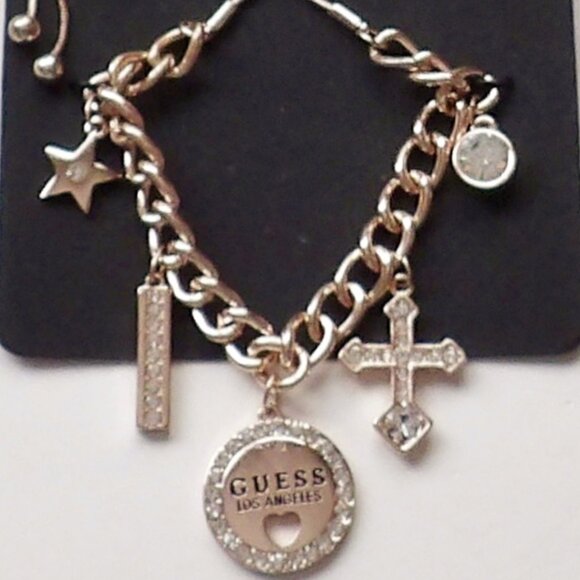 Guess Rose Gold colored Charm Bracelet Adjustable Cross Circle Pendant Star NWT - Picture 2 of 5